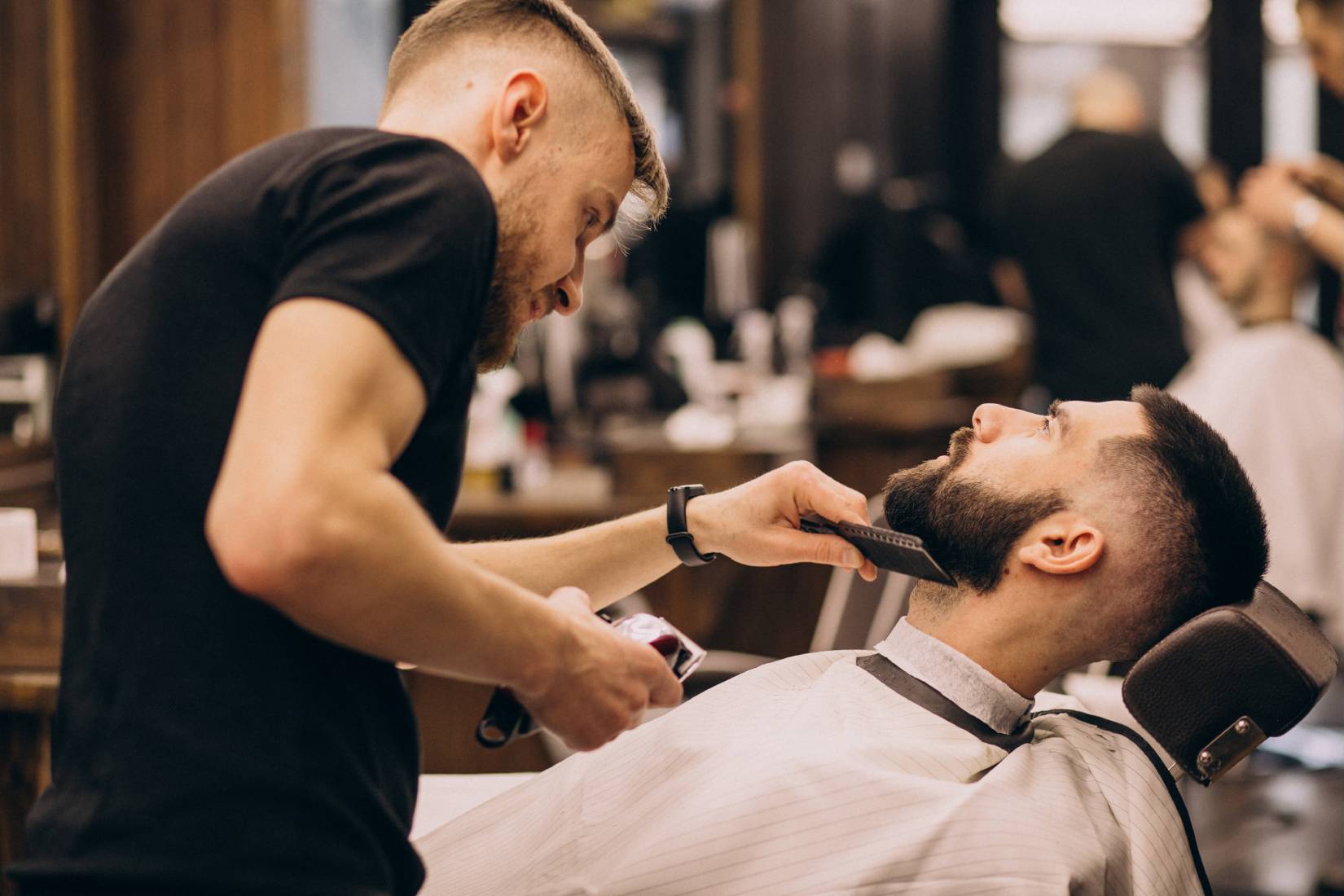 man-barbershop-salon-doing-haircut-beard-trim-1 (1)